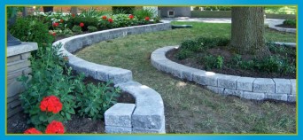 interlocking retaining walls surrounding gardens