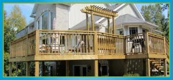 wooden deck and railings with pergola