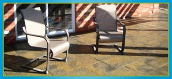 interlocking stone patio at back of house